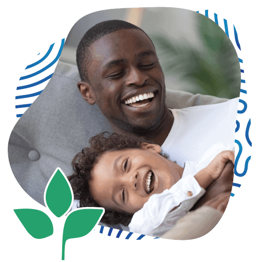 Healthcare Wellness Center Inland Naturopathic Upland CA services heart wellness Portrait of Happy Smiling Afro-American Family of Dad and Son Playing on the Couch