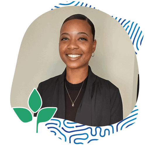 Healthcare Wellness Center Inland Naturopathic Upland CA about debaun Portrait of Afro-American Lady Smiling Wearing a Black Coat with a White Background. Debaun